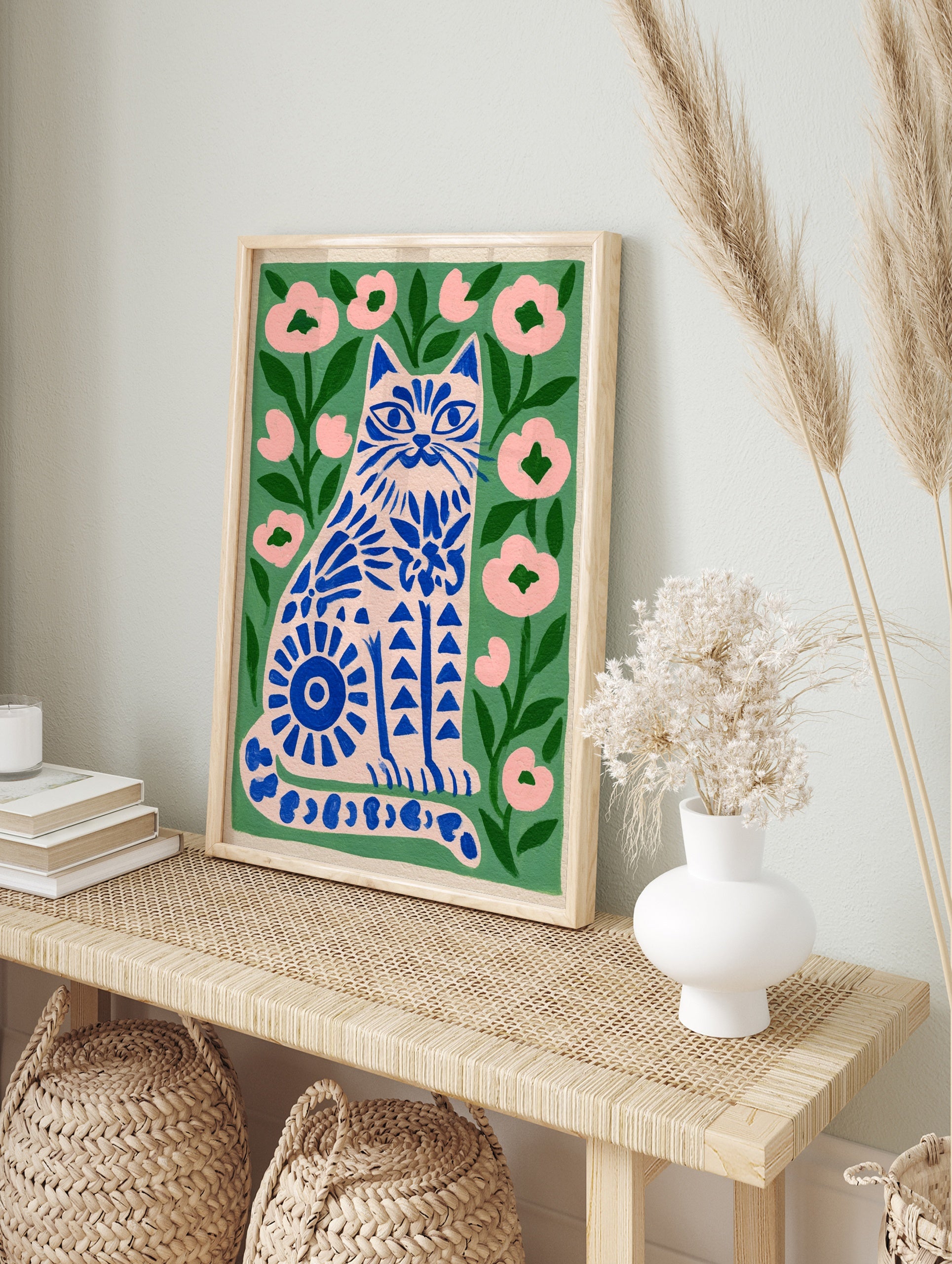 Illustrative blue cat print with floral patterns on a green background, perfect for modern, in an alternate framed mockup