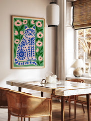 Illustrative blue cat print with floral patterns on a green background, perfect for modern home, in a styled room mockup
