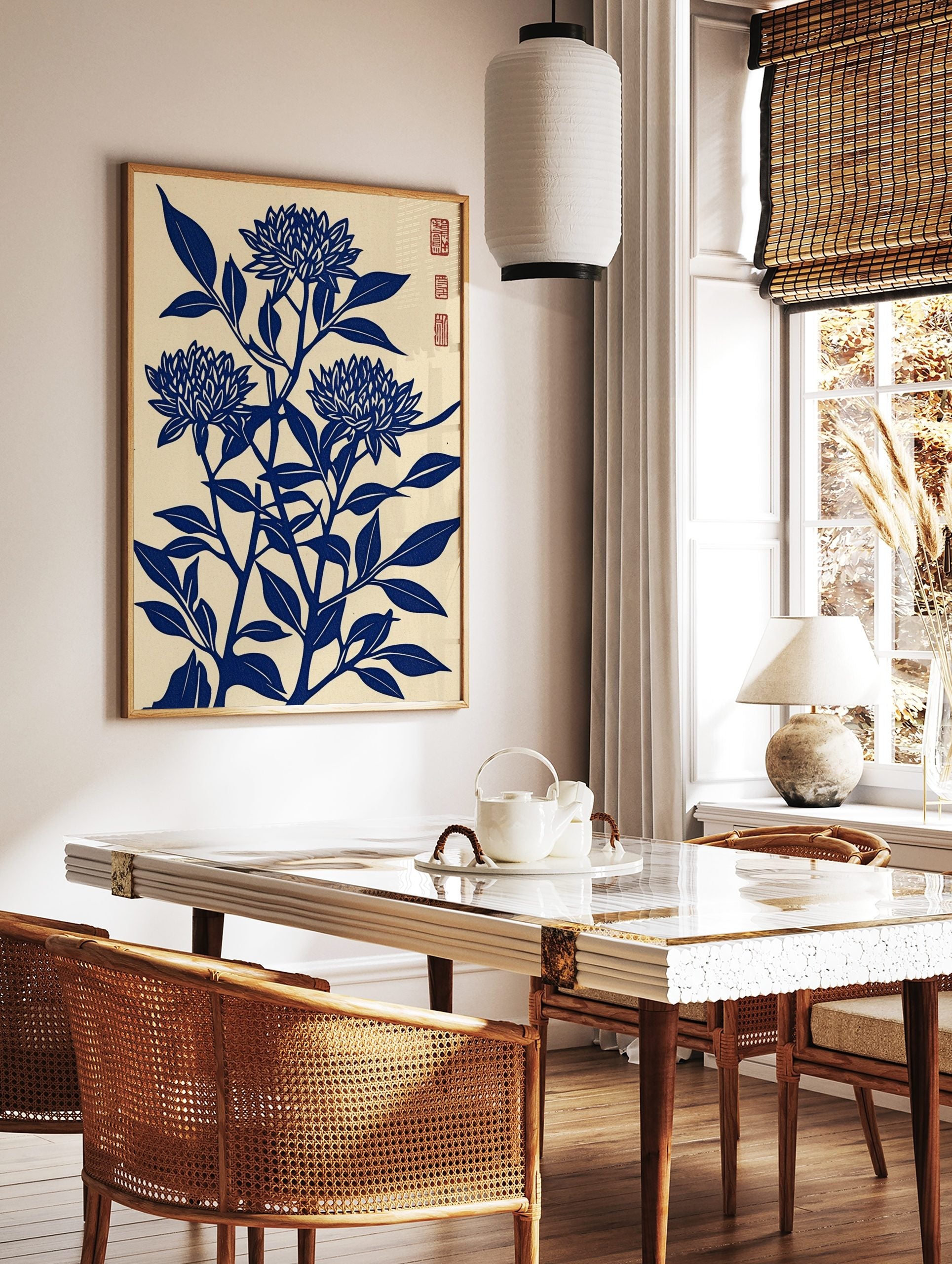 Blue chrysanthemum flower woodblock art print with leaves on a cream background, portrait, in a styled room mockup
