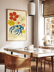 Illustrative art print of a blue crab with floral patterns, surrounded by red and yellow flowers on, in a styled room mockup