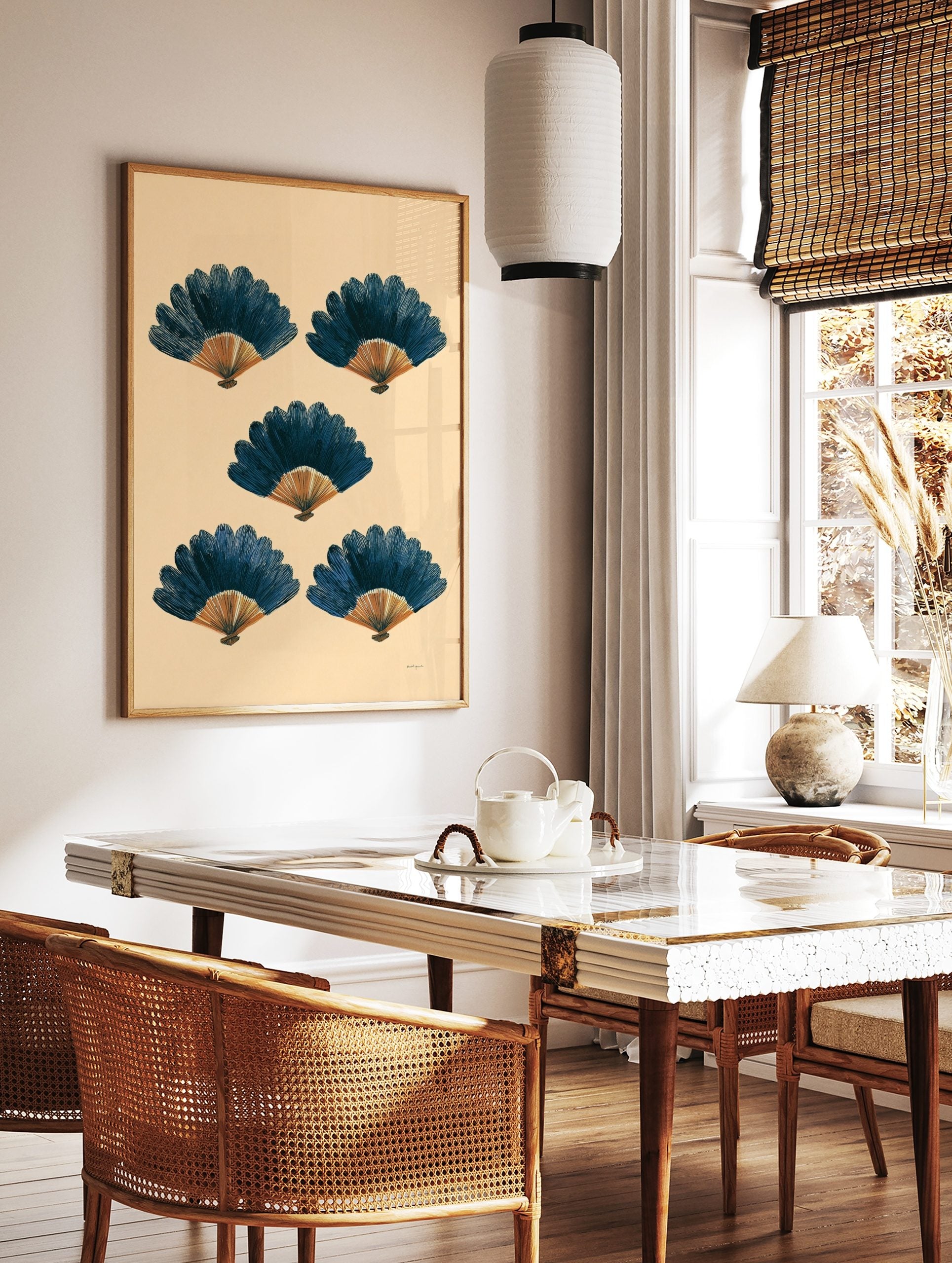 Five illustrative blue and orange-brown fans arranged symmetrically on a beige background, in a styled room mockup