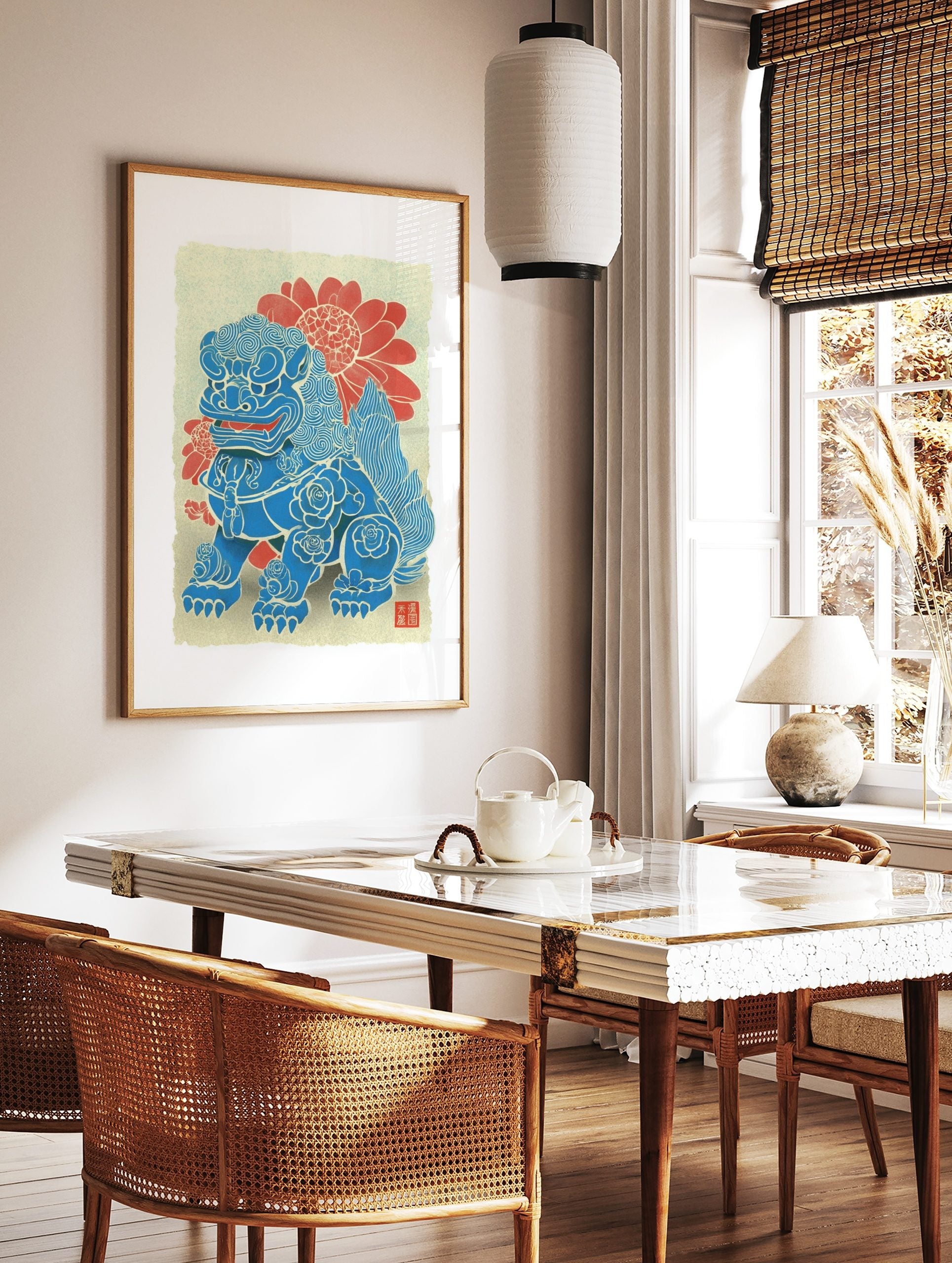Blue Foo Dog guardian lion art print with swirling patterns, rose motifs, red flowers, and Japanese, in a styled room mockup