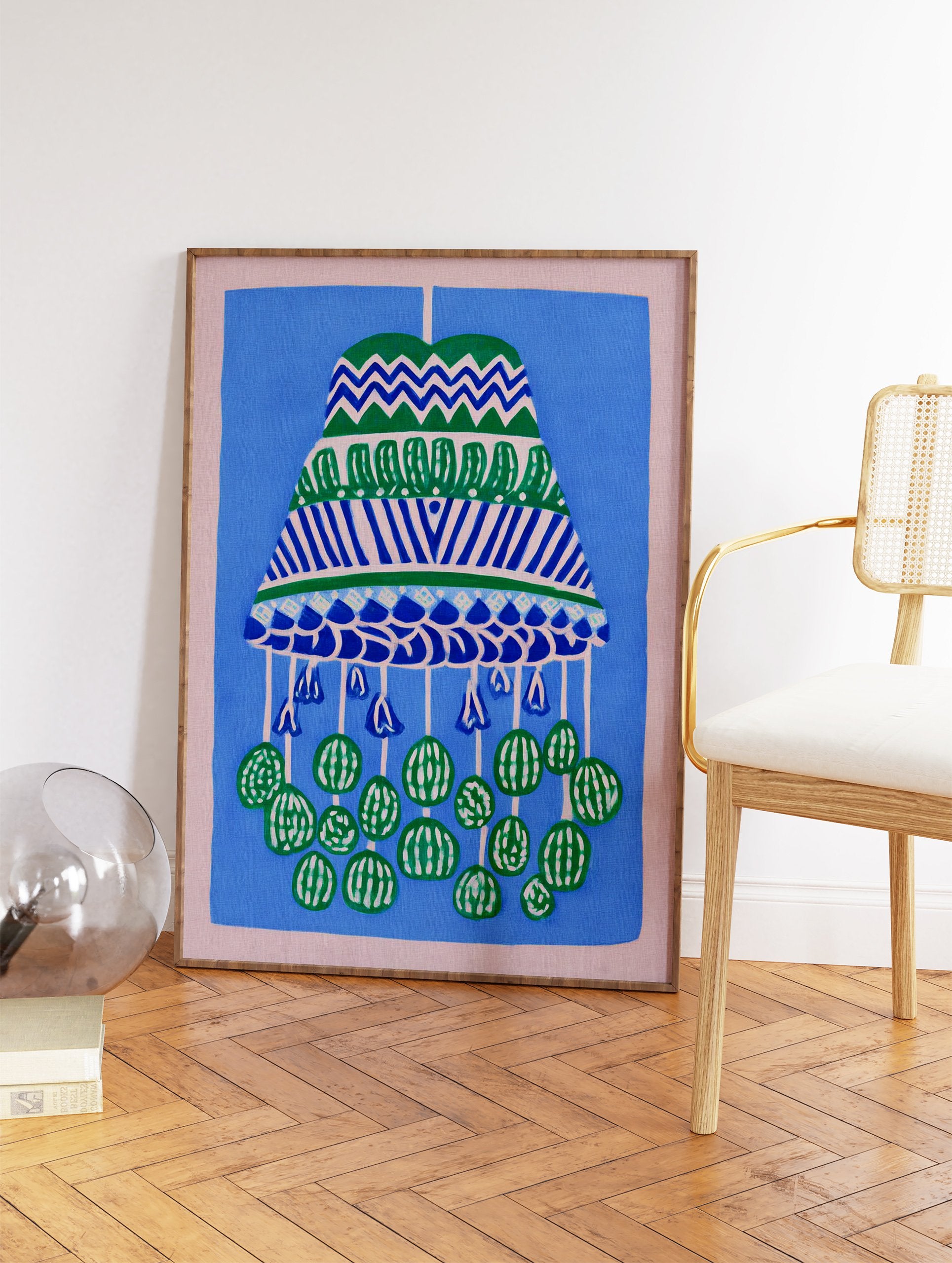 Illustrative blue and green pattern wall art print featuring a decorative hanging mobile design on a blue background with a pink border. - Image 2