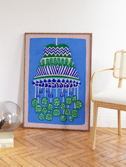 Illustrative blue and green pattern wall art print featuring a decorative hanging mobile design on a blue background with a pink border. - Image 2