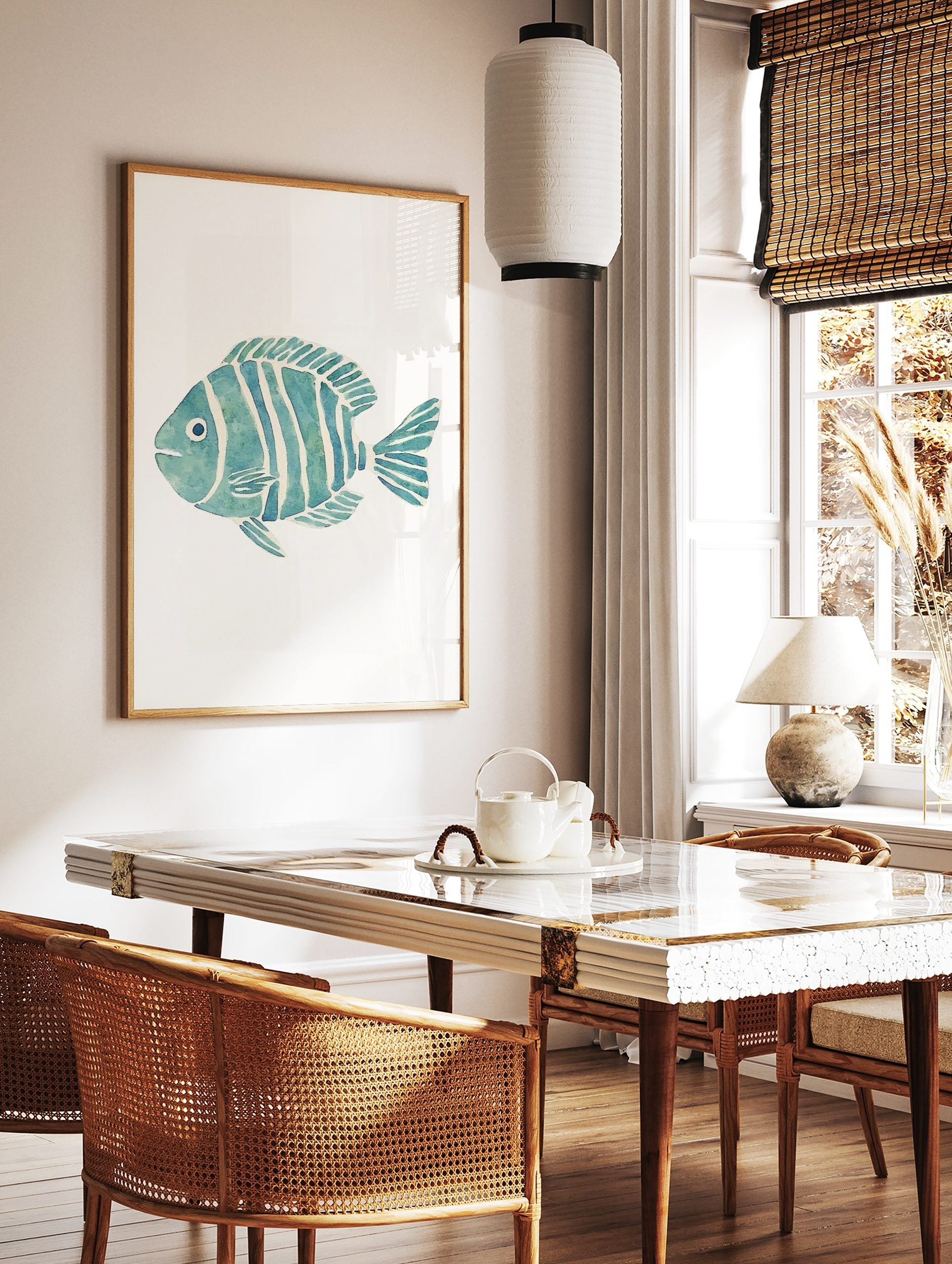 Blue and green striped fish watercolour illustration art print on a white background, facing left, in a styled room mockup