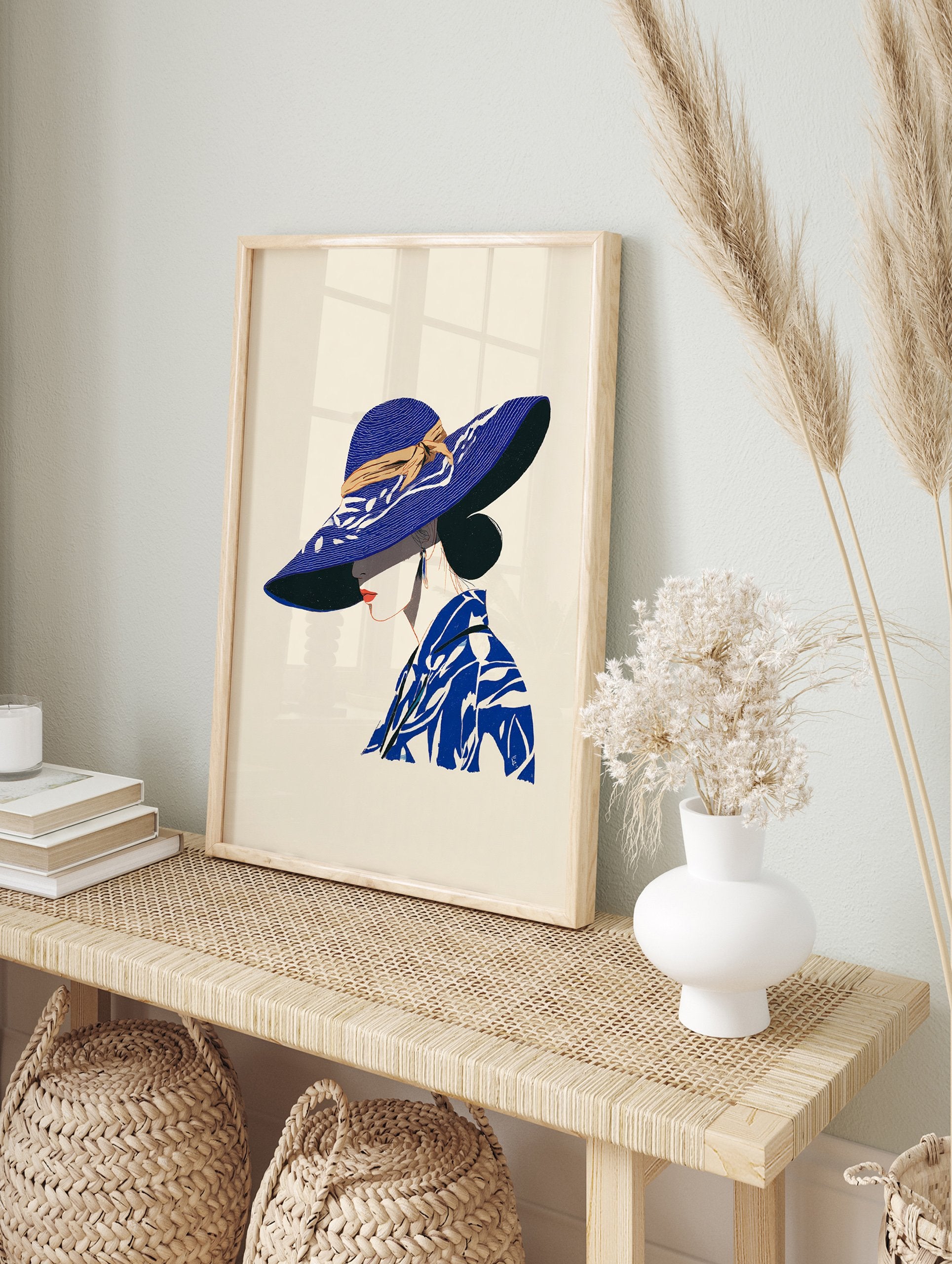 Illustrated Blue Hat Woman Wall Art print, profile view, wearing a wide-brimmed blue hat with tan ribbon and patterned blue top - Image 3