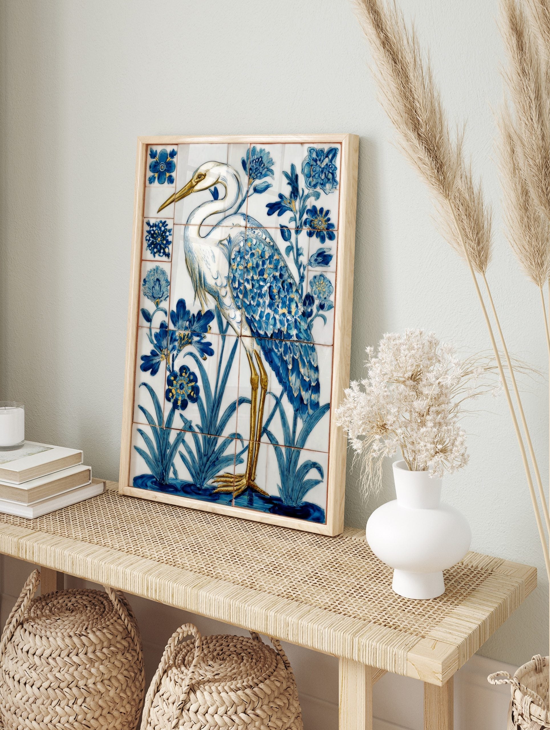 White heron with blue and gold feathers standing in water with blue flowers, in a tile-style, in an alternate framed mockup