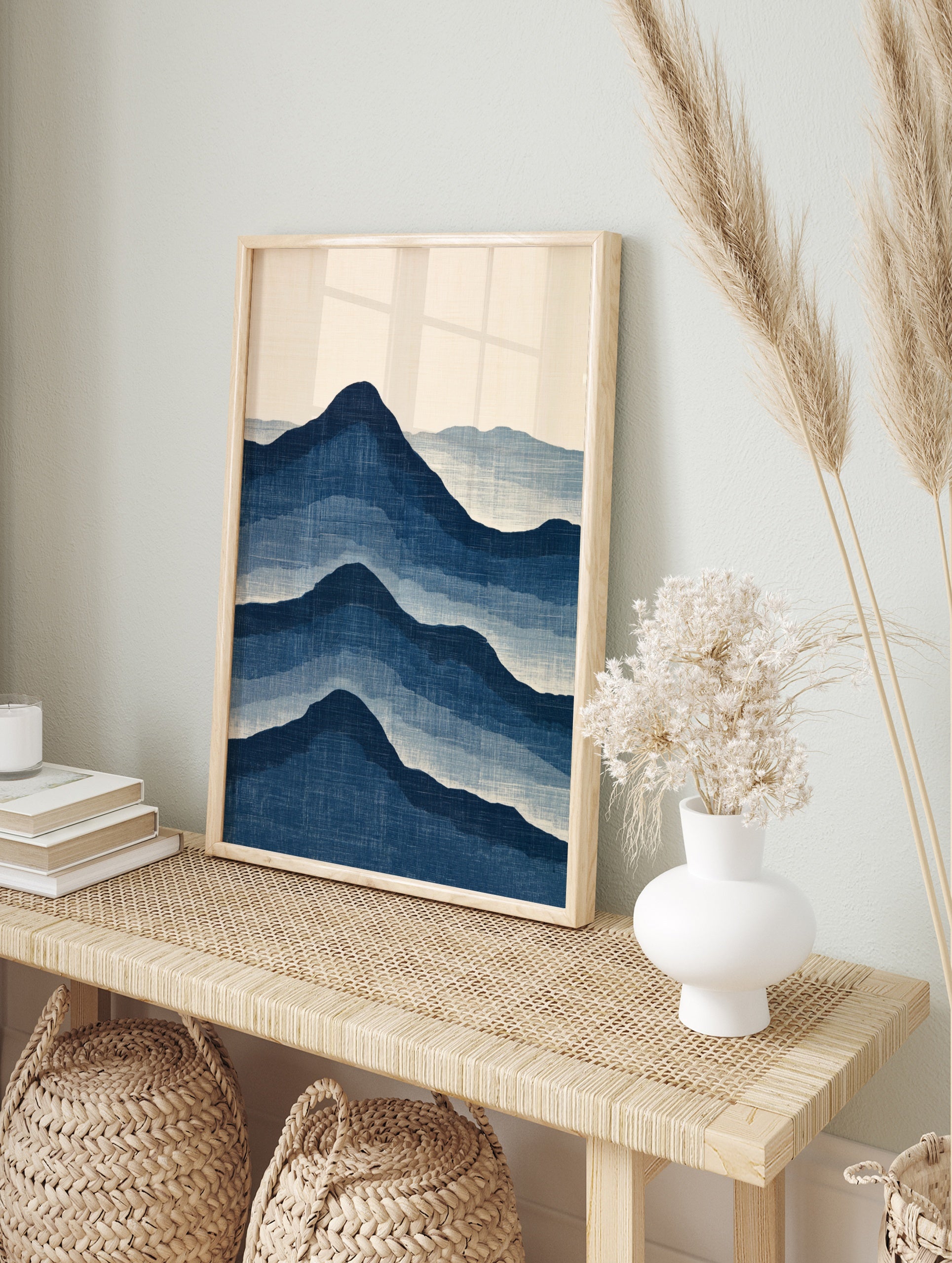 Japanese style mountain landscape art print with layered blue peaks on a cream background, in an alternate framed mockup