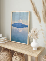 Minimalist blue mountain reflection landscape painting with soft white cloud, watercolour, in an alternate framed mockup