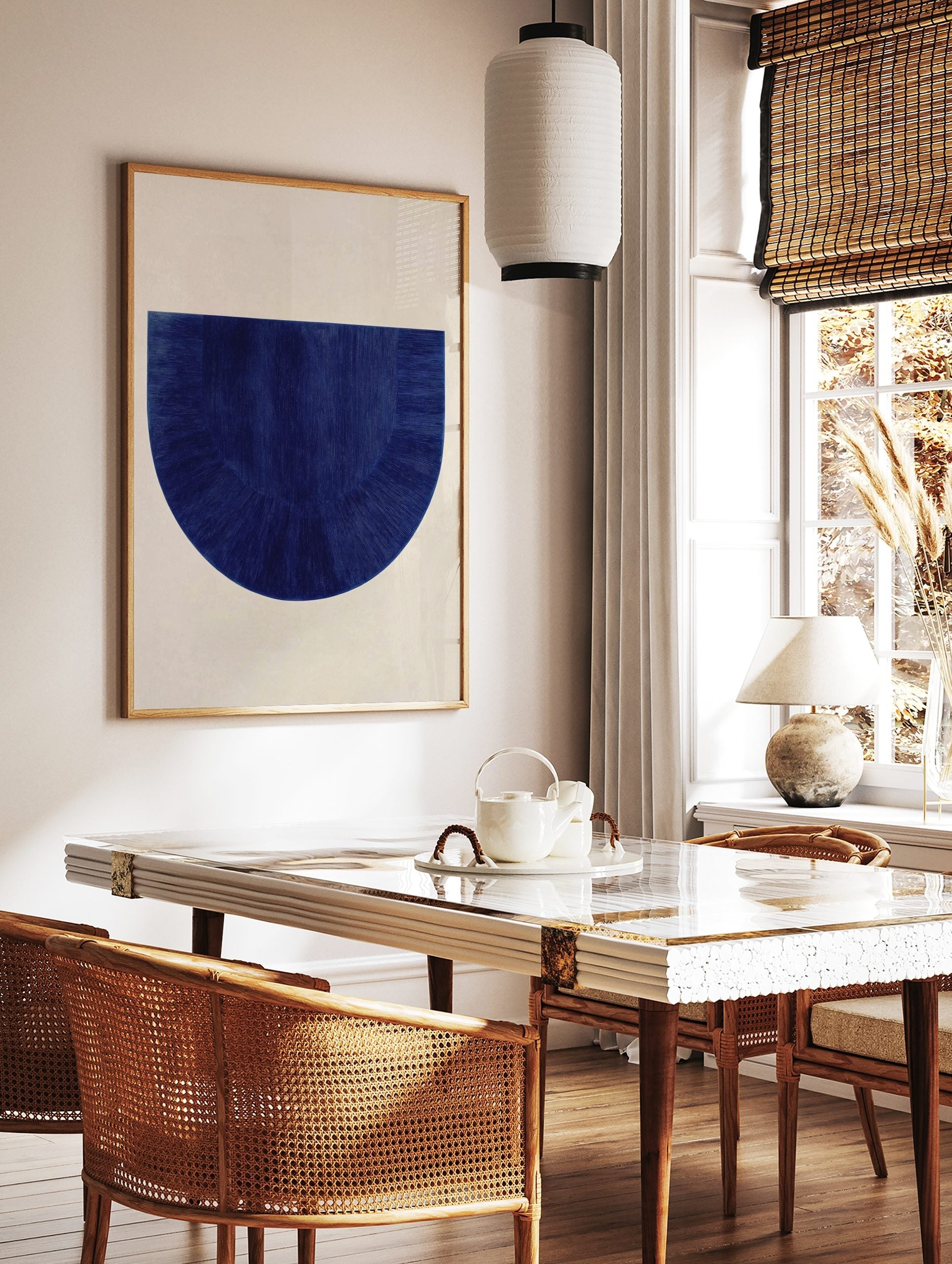 Textured deep blue semi-circle abstract art print with vertical and radiating lines on a light, in a styled room mockup