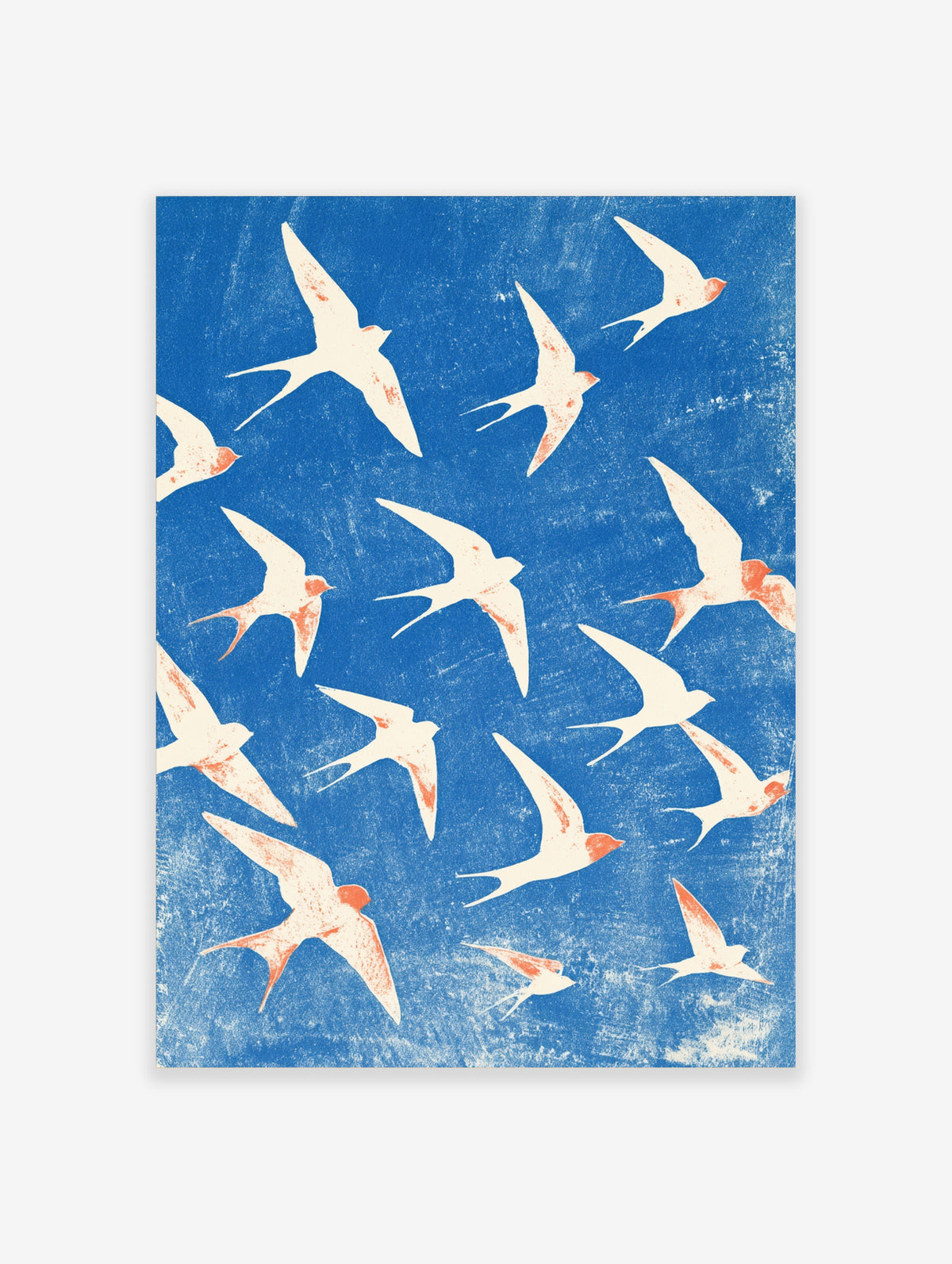 Blue swallow wall art print with flying bird silhouettes in cream and coral on textured blue background
