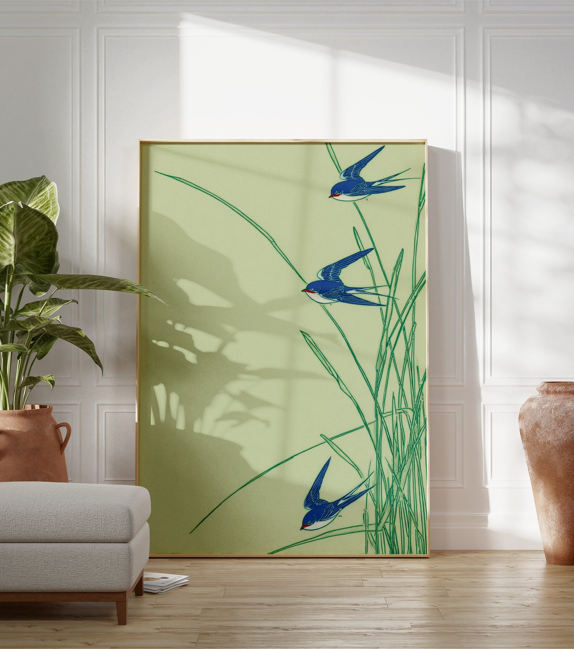 Japanese-style art print featuring three blue swallows flying through green reeds on a light green background. - Image 3