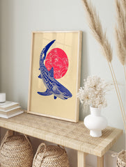 Blue whale shark illustration against a red sun with white waves, in a Japanese-style art, in an alternate framed mockup
