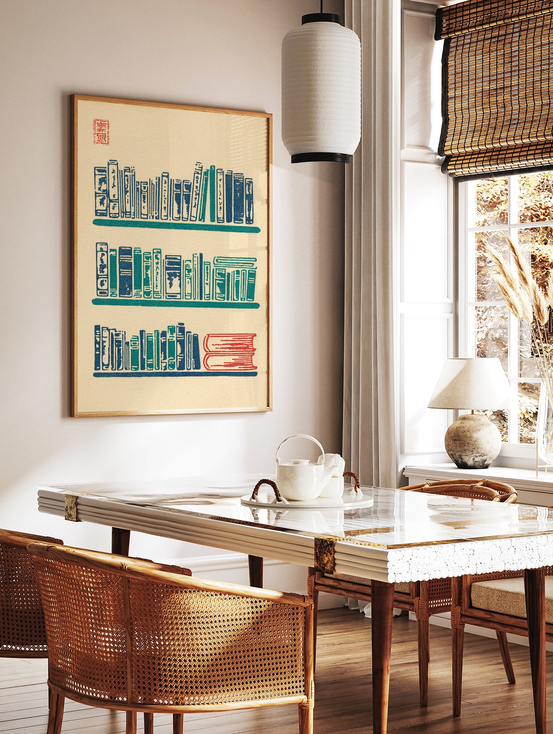 Woodblock print of three bookshelves filled with blue, teal, and red books on a beige background with a red stamp. - Image 2