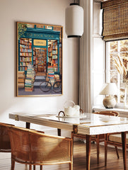 An illustrated bookstore poster showing 'The Book Nook' storefront with stacks of books outside and a bicycle. - Image 2
