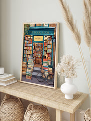 An illustrated bookstore poster showing 'The Book Nook' storefront with stacks of books outside and a bicycle. - Image 4