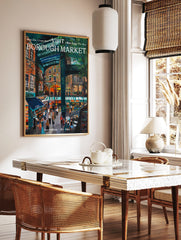 Vibrant illustrative painting of Borough Market in London with people, stalls, and buildings under an arched roof, displayed as the same artwork in a styled poster mockup for home decor