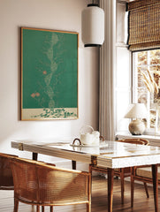 Botanical DNA double helix wall art with flowering vines and pink blossoms on a green background, in a styled room mockup