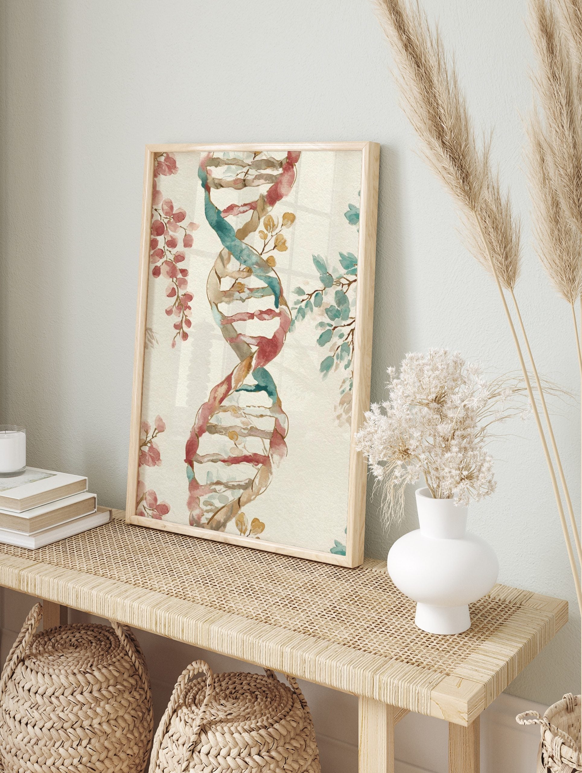 Watercolour DNA double helix with interwoven reddish-pink and teal botanical leaves on a, in an alternate framed mockup