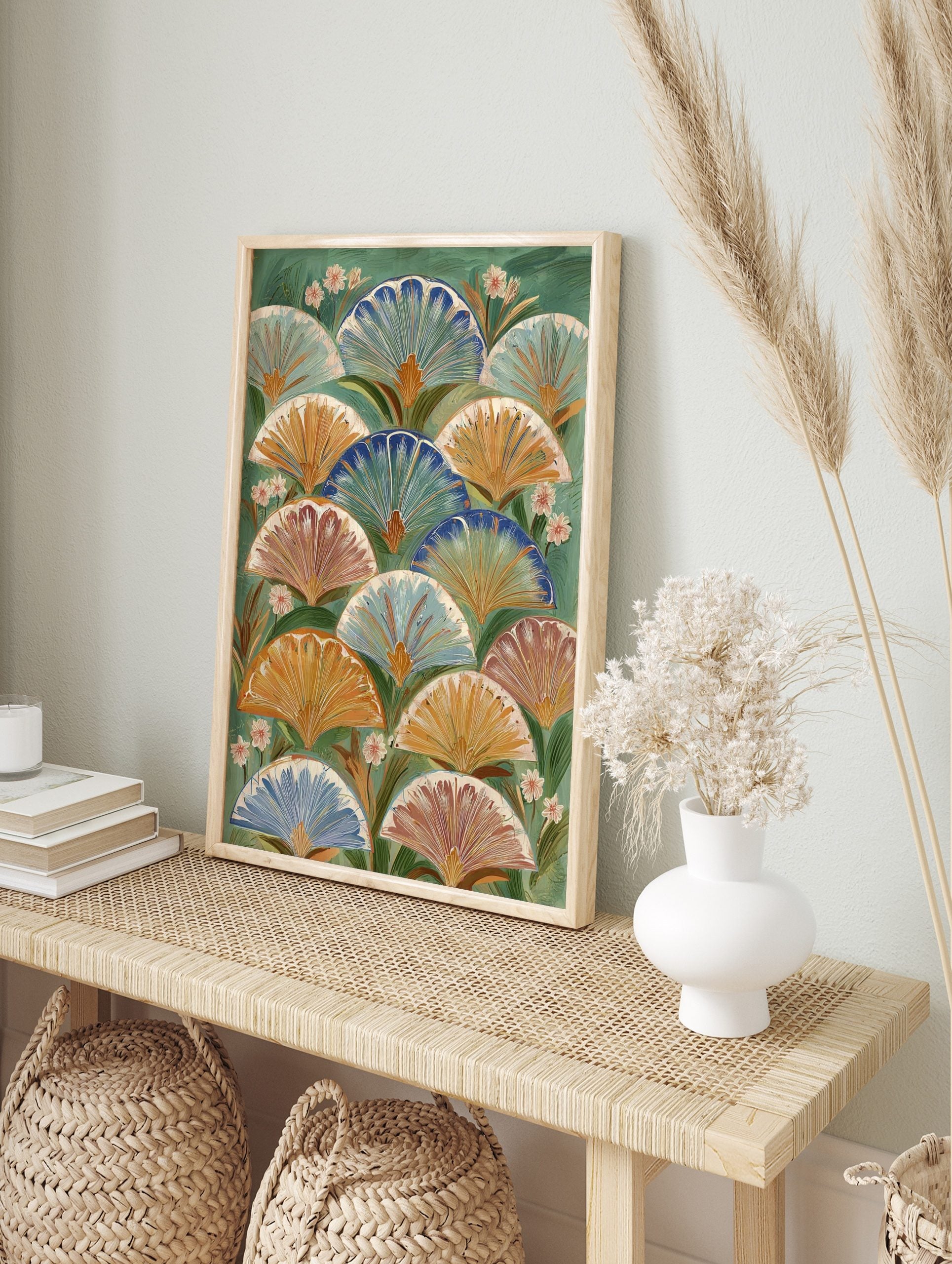 Botanical fan pattern wall art with layered blue, orange, and terracotta fan shapes on a, in an alternate framed mockup