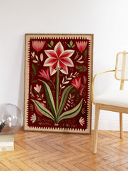 Red botanical wall art print featuring a detailed Amaryllis flower illustration with green leaves and a decorative border. - Image 2