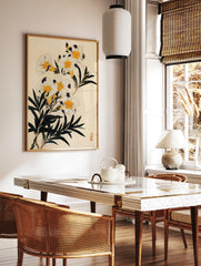 Botanical illustration of white flowers with yellow centres, dark purple accents, and green leaves, in a styled room mockup