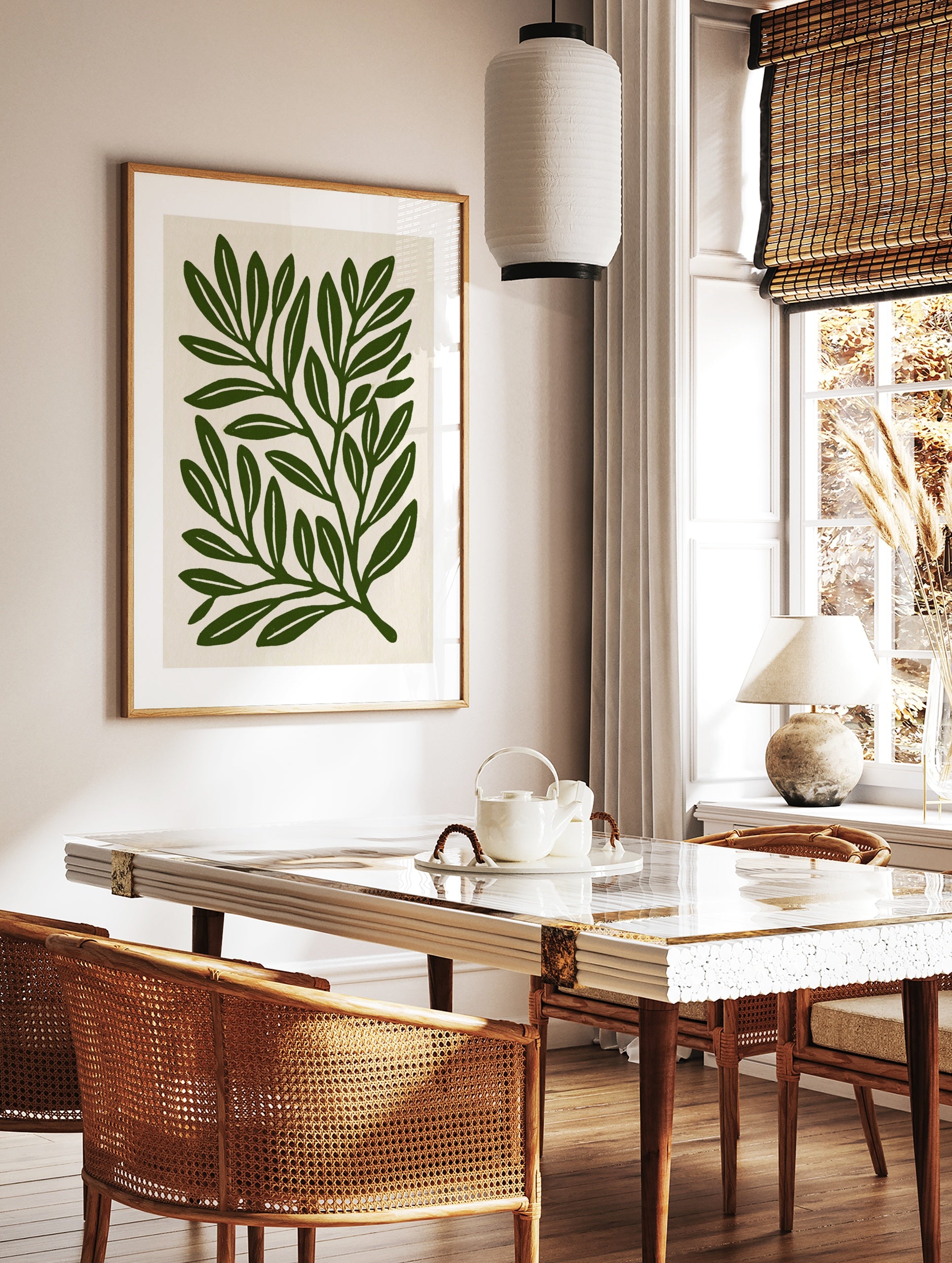 Botanical leaf illustration art print with deep green foliage on a cream background, in a styled room mockup