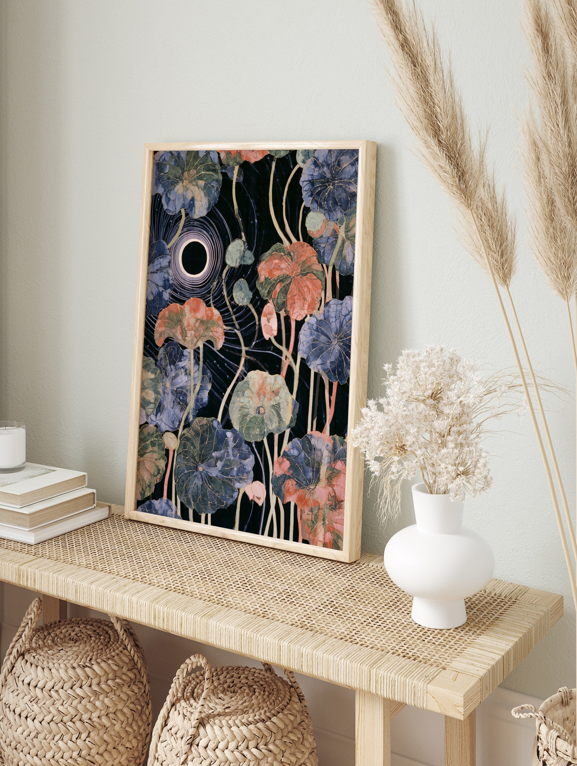 Botanical lotus leaf art print with celestial eclipse motif and gold veins on dark background, in an alternate framed mockup
