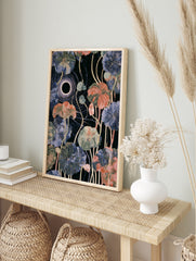 Botanical lotus leaf art print with celestial eclipse motif and gold veins on dark background, in an alternate framed mockup