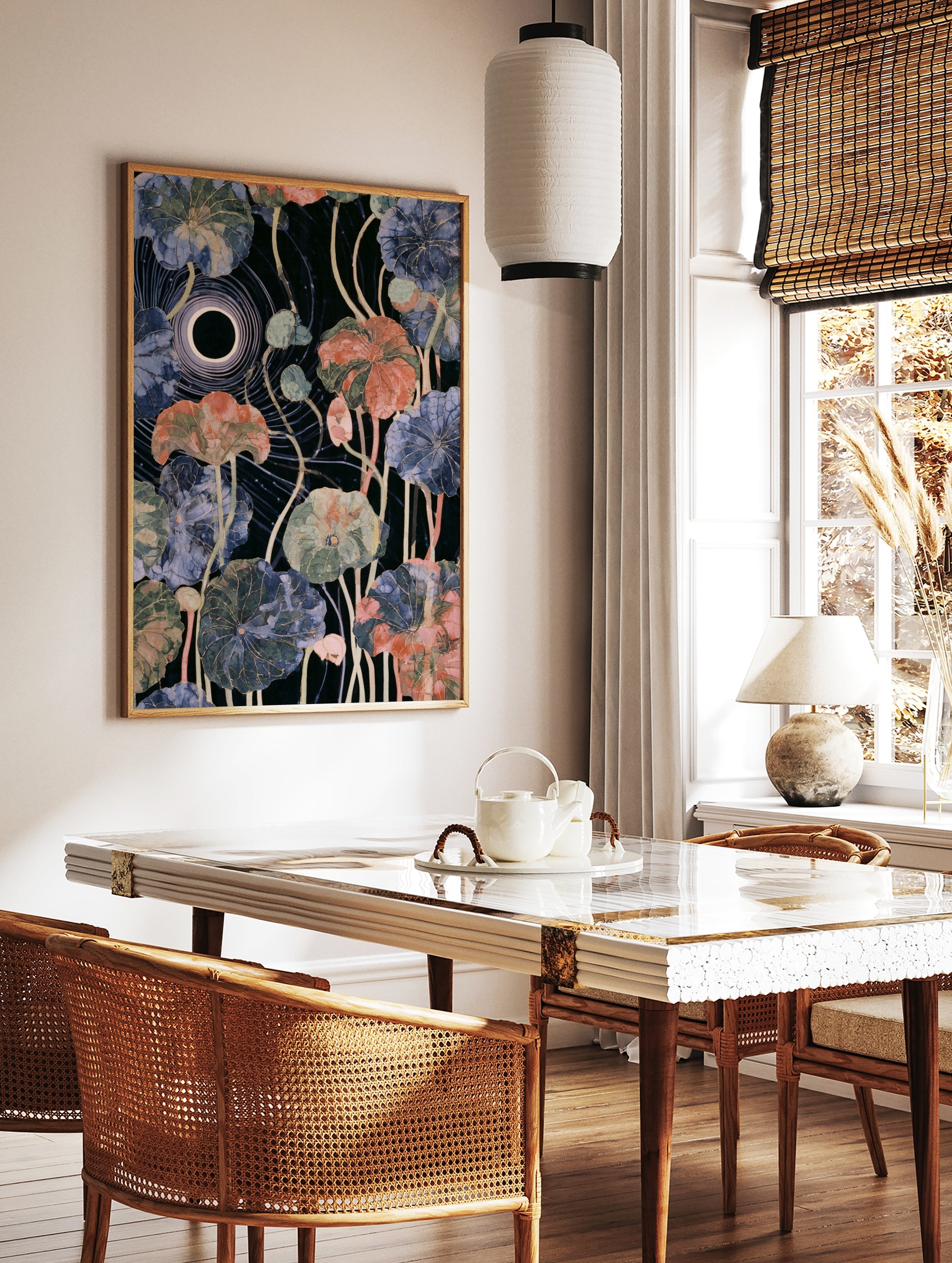 Botanical lotus leaf art print with celestial eclipse motif and gold veins on dark background, in a styled room mockup