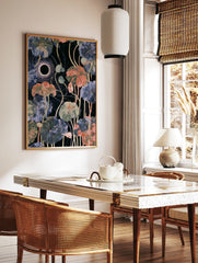 Botanical lotus leaf art print with celestial eclipse motif and gold veins on dark background, in a styled room mockup