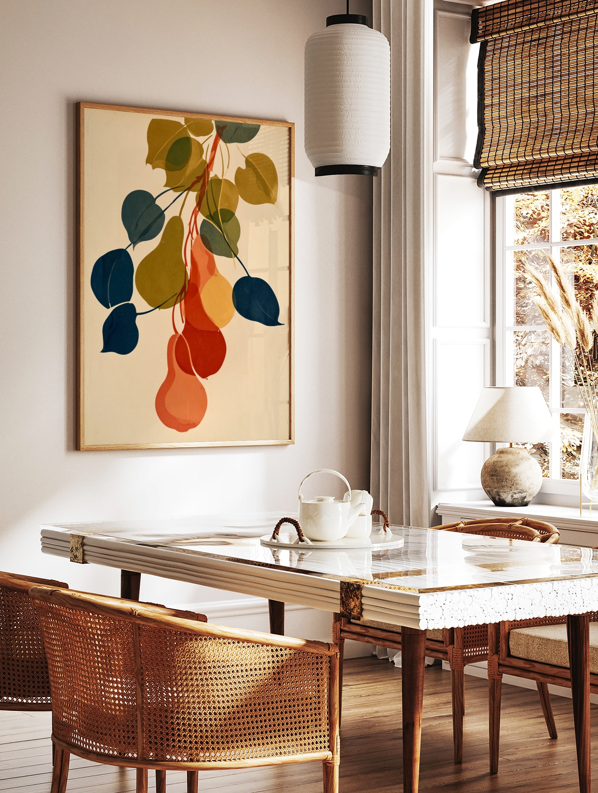 Botanical pear wall art illustration with overlapping navy, olive, and orange fruit shapes on cream, in a styled room mockup