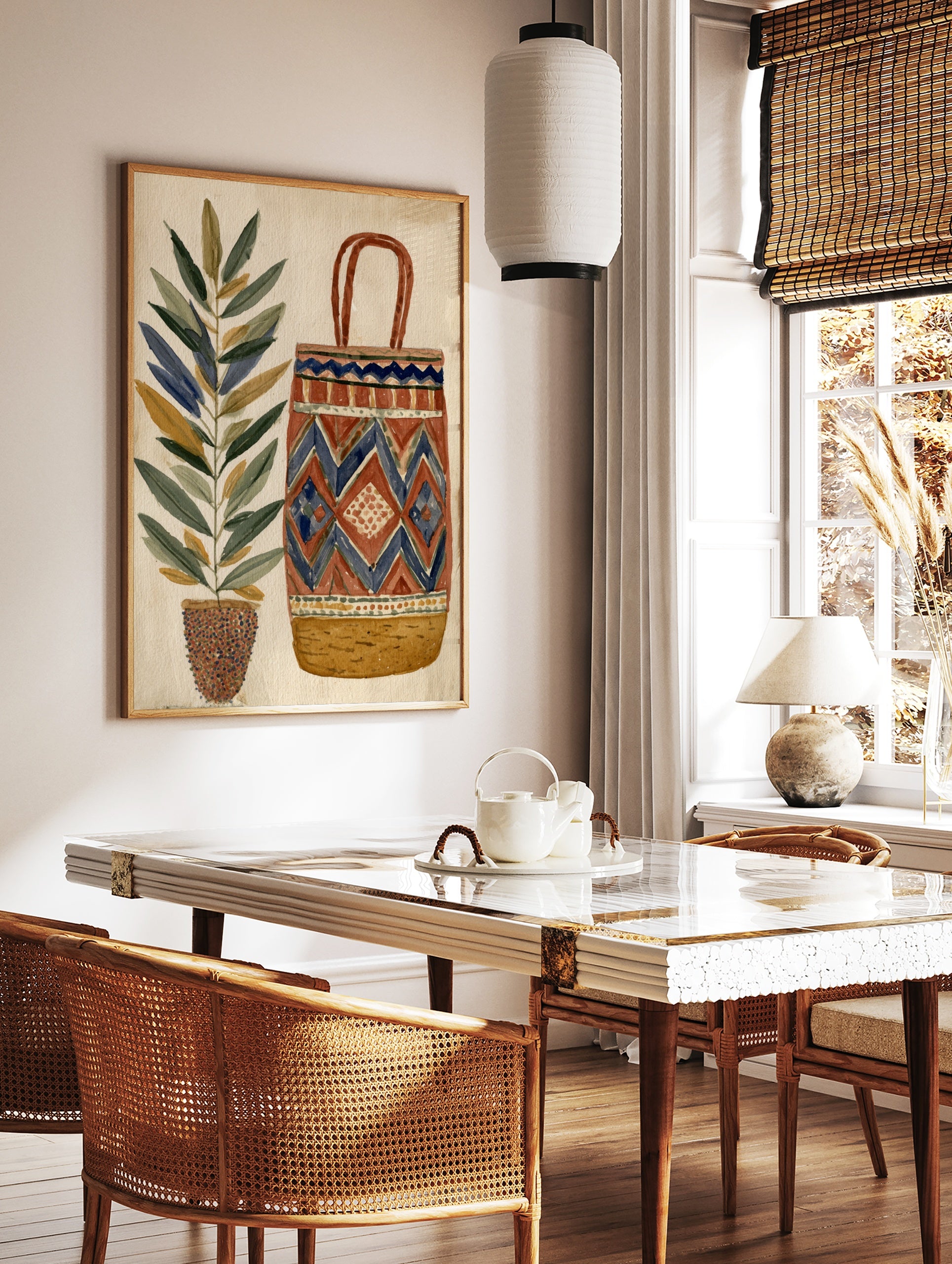 Illustrative wall art print of a tall potted plant next to a geometric patterned woven basket in, in a styled room mockup