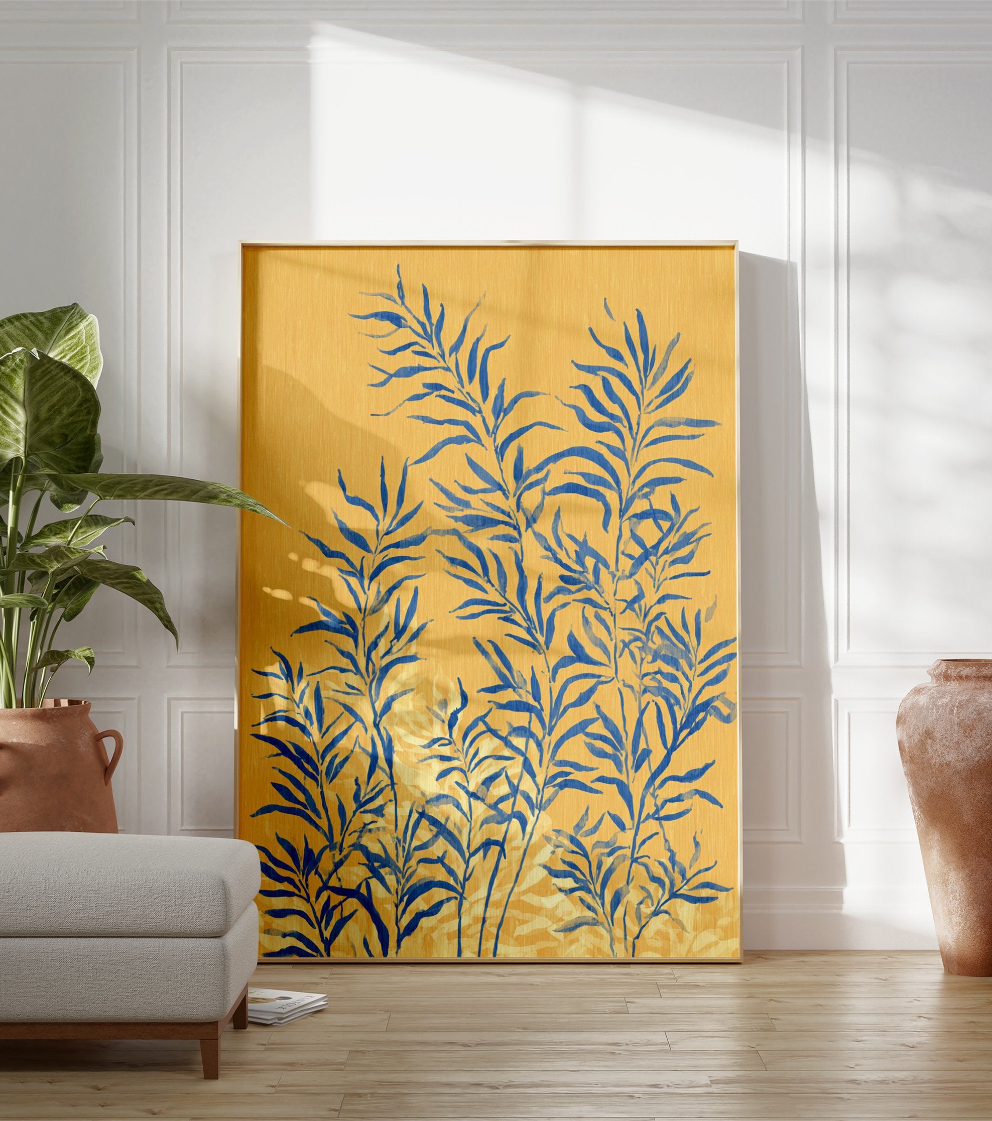 Botanical wall art print with blue leaves on a textured yellow background, featuring a modern illustrative style. - Image 3