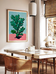 Modern botanical wall art featuring a green plant with bold leaves on a pink and blue background. - Image 2