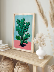 Modern botanical wall art featuring a green plant with bold leaves on a pink and blue background. - Image 3