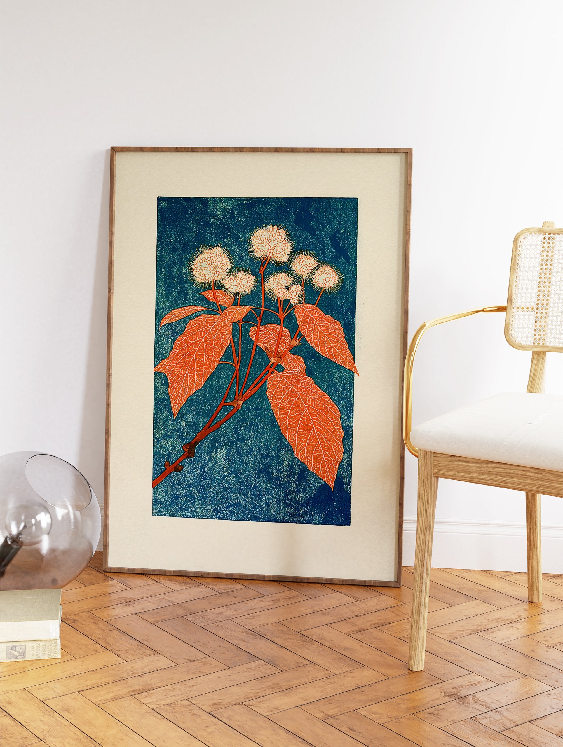 Botanical wall art print depicting a plant with round white flowers and large orange leaves on a blue textured background. - Image 2