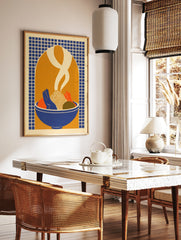 Illustrative print of a bowl of food with vegetables and rising steam against a blue grid and, in a styled room mockup