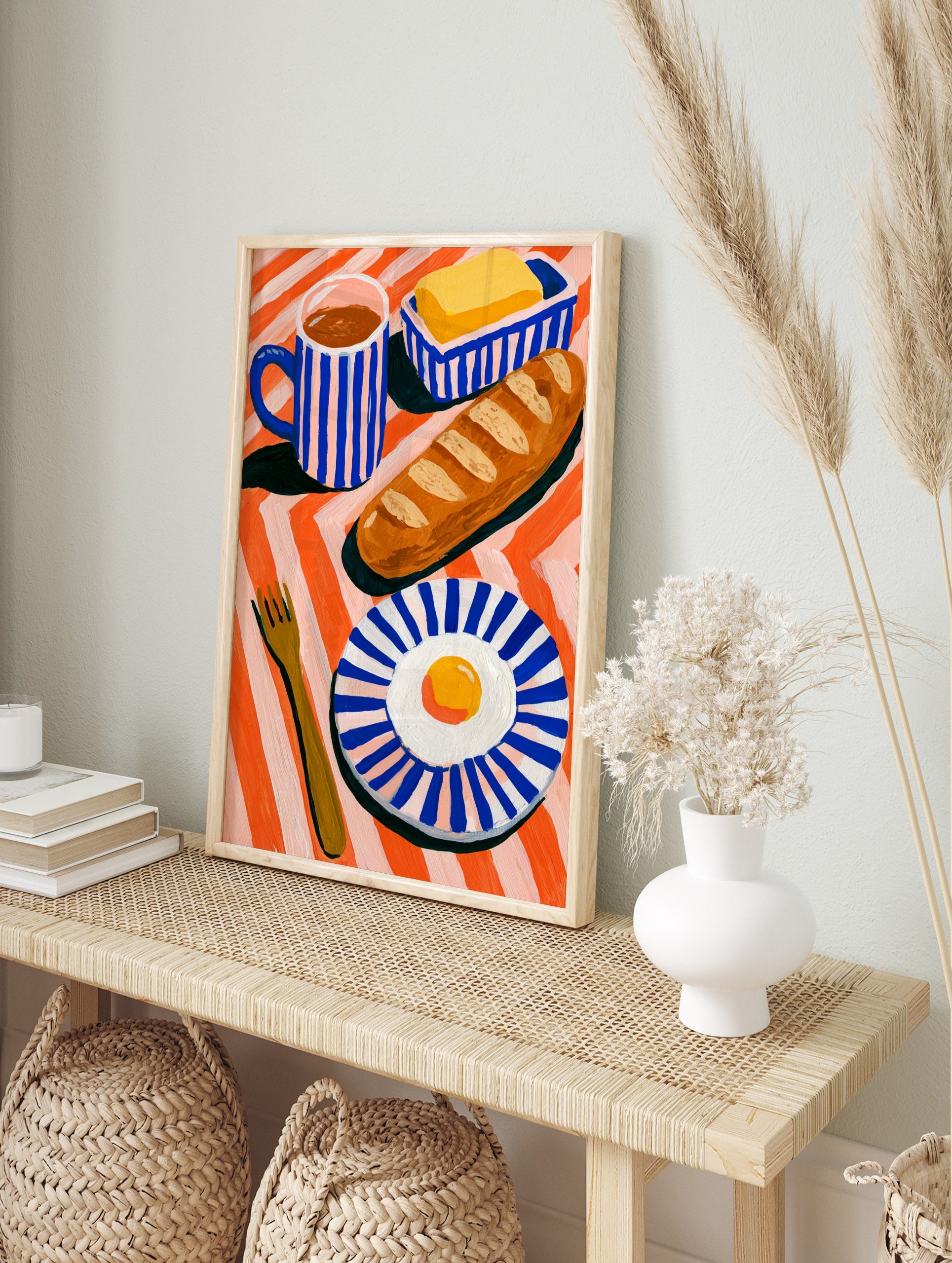 Breakfast still life illustration with baguette, fried egg, and coffee on a striped orange, in an alternate framed mockup