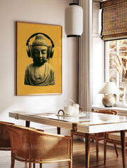 A stylized Buddha bust wearing over-ear headphones against a vibrant mustard yellow background, in a styled room mockup