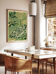 Botanical art print featuring a detailed butterfly with striped wings on a sage green background, in a styled room mockup