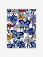 Vibrant butterfly wall art featuring blue butterflies and colorful daisy flowers on a blue and white checkered background.