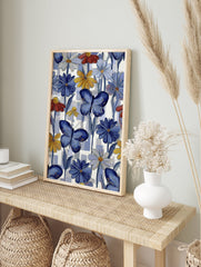 Vibrant butterfly wall art featuring blue butterflies and colorful daisy flowers on a blue and white checkered background. - Image 3