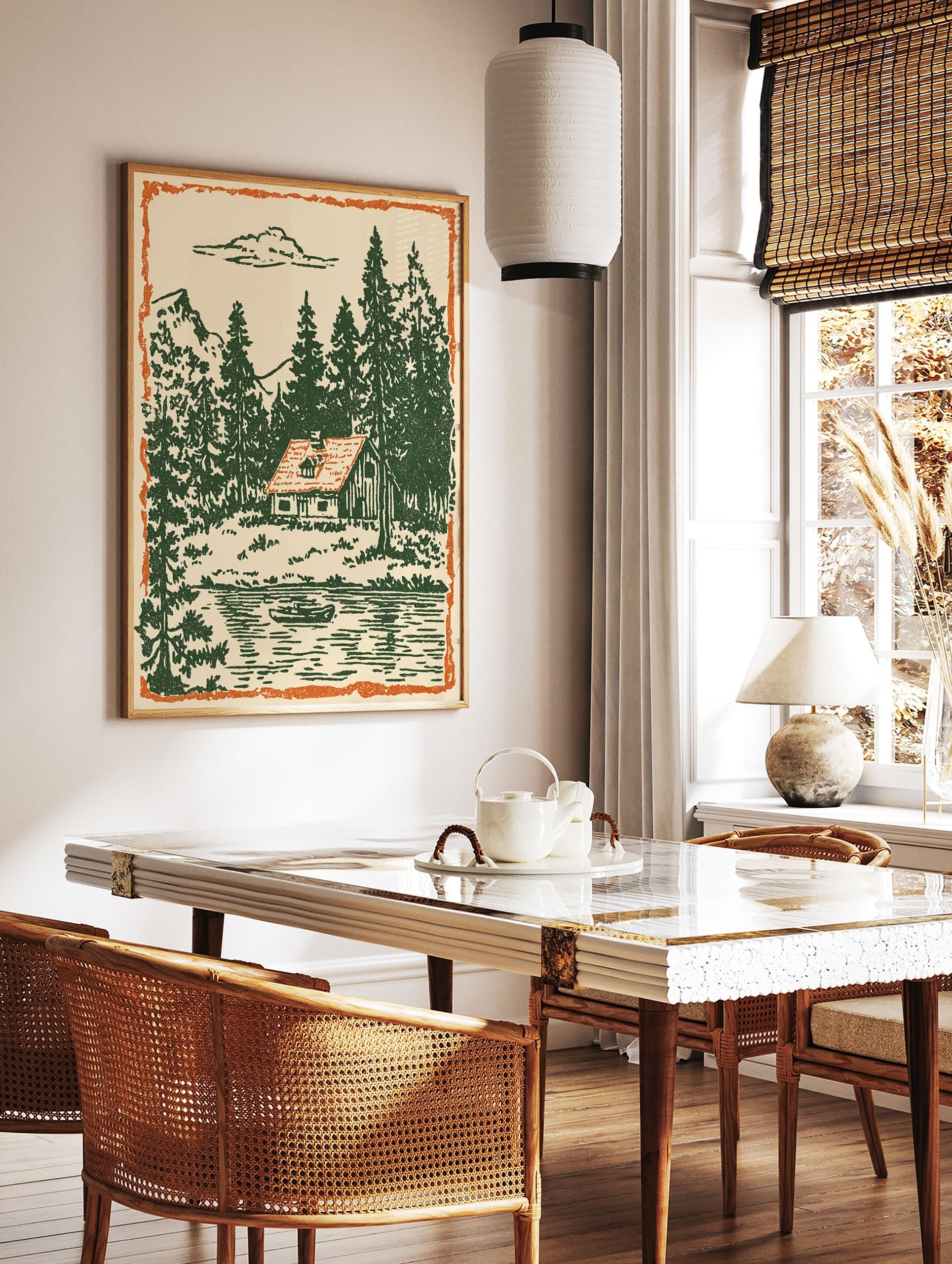 Vintage illustration of a cabin by a lake with green pine trees, mountains, and an orange border. - Image 3