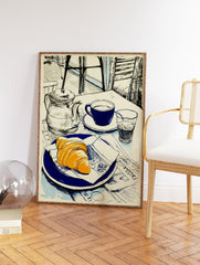 Illustrative art print of a cafe breakfast with a croissant, blue coffee cup, and teapot on a newspaper-covered table. - Image 2
