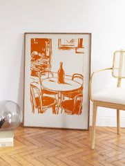 Vintage orange cafe street scene illustration print with a table, bottle, and chairs on a light background. - Image 2