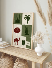 Cairo travel poster art featuring icons like a mosque, palm tree, sailboat, and camel in a, in an alternate framed mockup