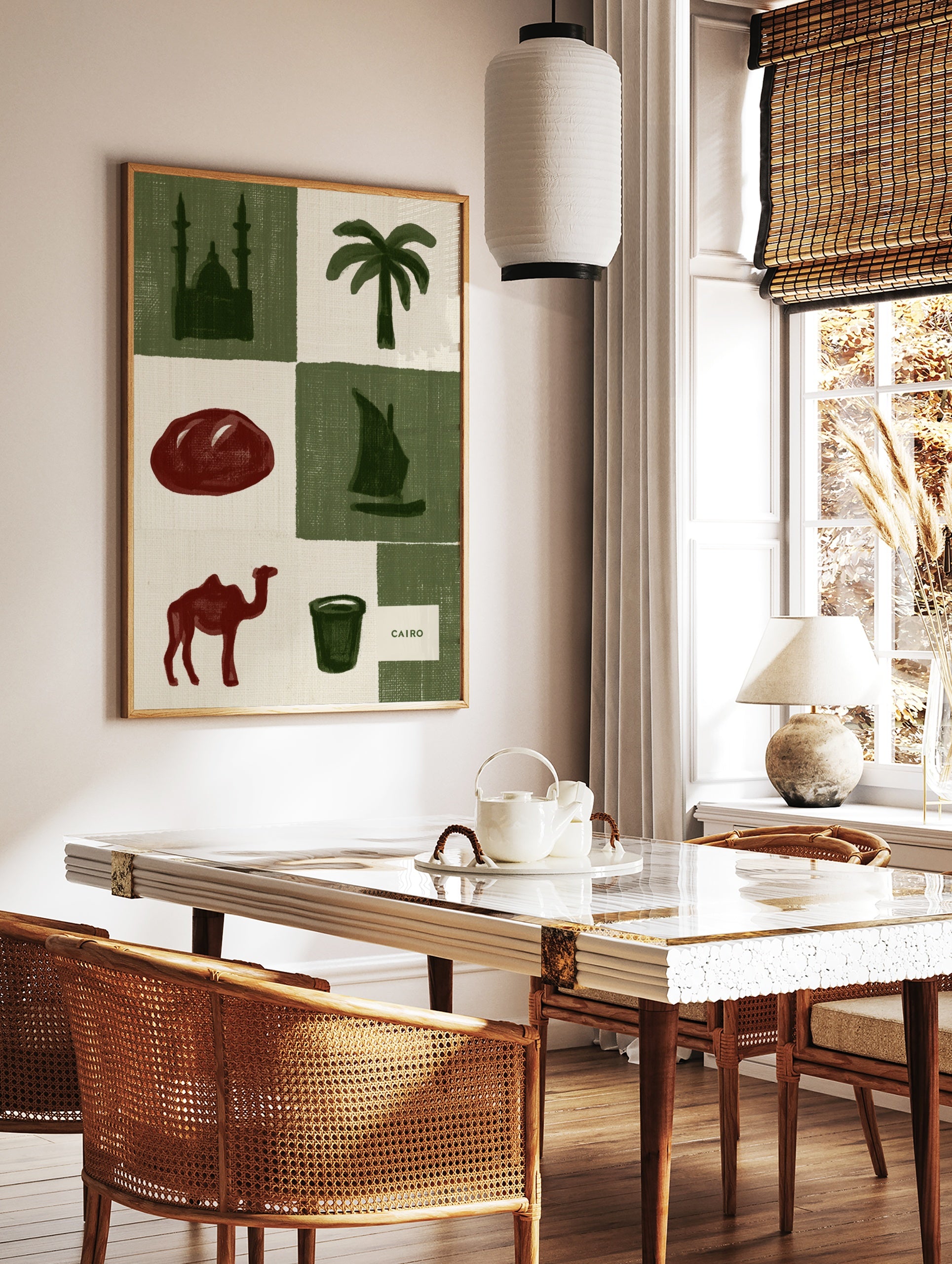 Cairo travel poster art featuring icons like a mosque, palm tree, sailboat, and camel in a green, in a styled room mockup