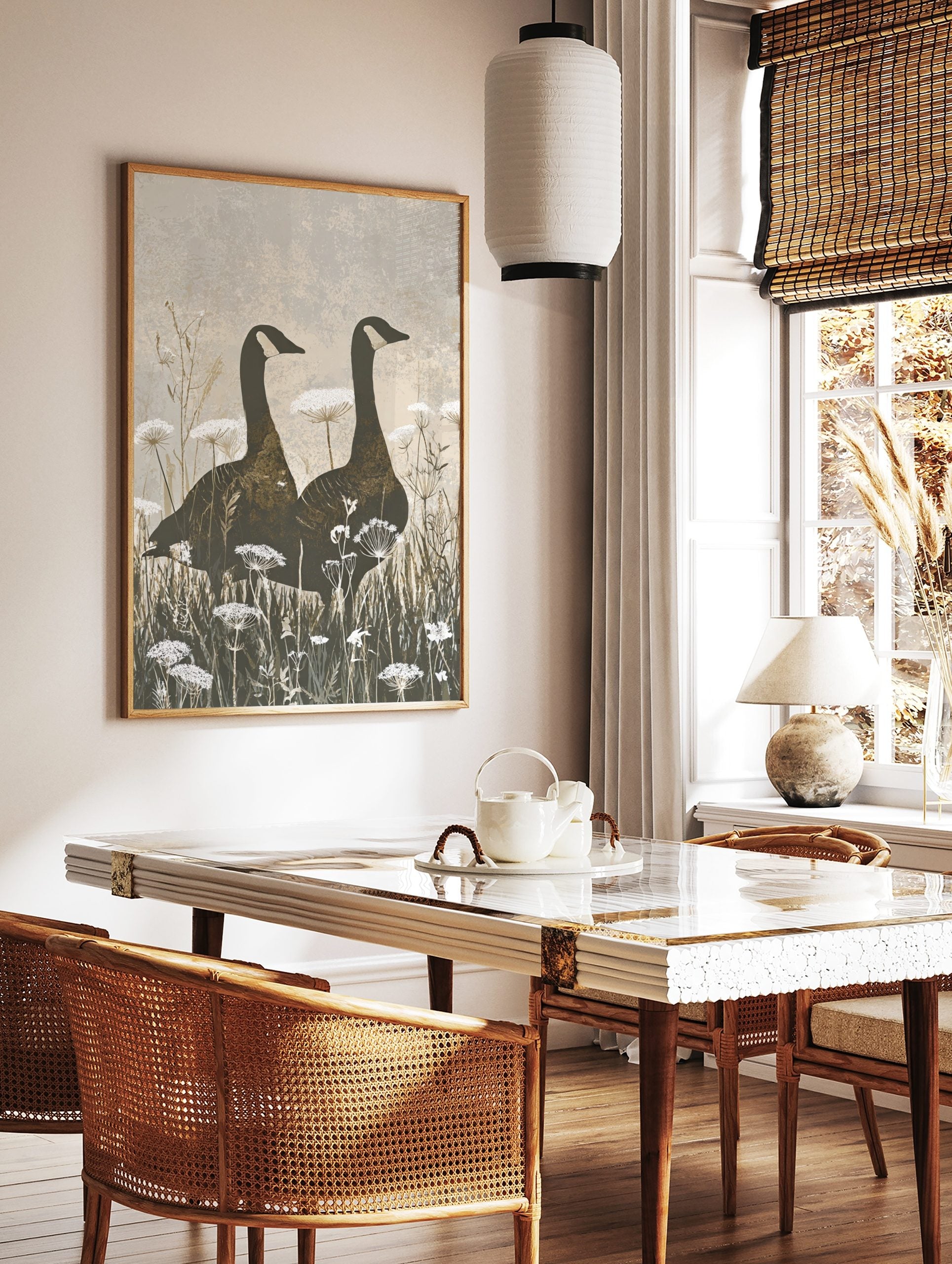 Two Canada geese silhouettes stand in a field of white Queen Anne's Lace flowers, earthy tones art, in a styled room mockup