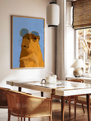 Illustrated capybara wearing oversized sunglasses against a solid blue background, in a styled room mockup